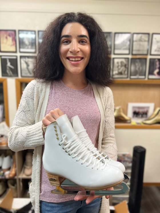 Brooke holding her new Harlick Figure Skates