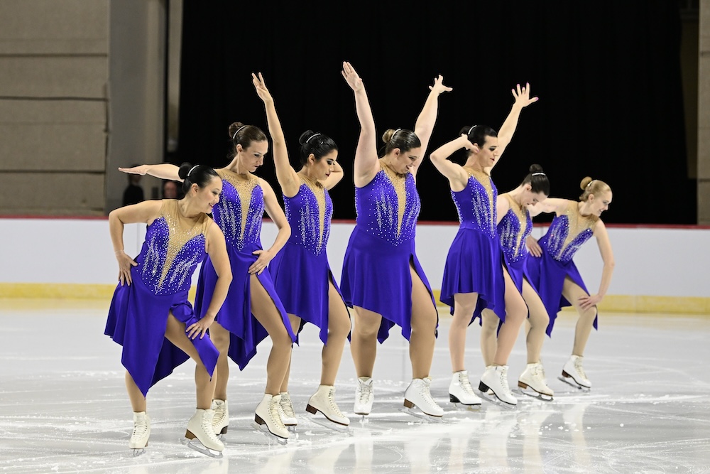 Brooke with her starting line from an angle while waiting in their starting poses.